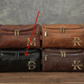 Men's black PU travel bag with a separate makeup pouch included