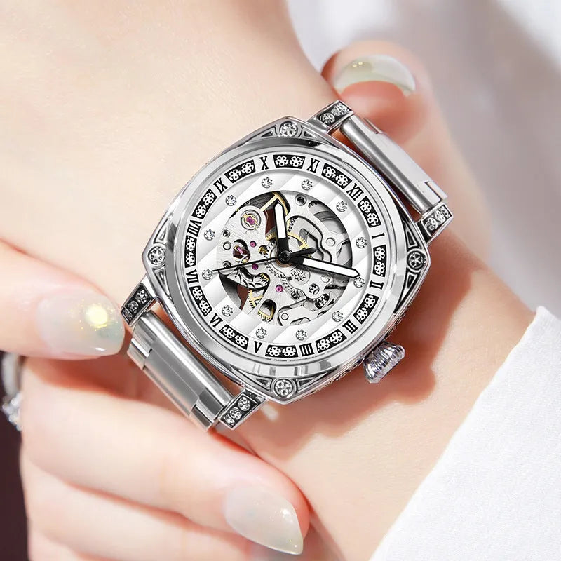 Men's mechanical wristwatch with a leather strap and luminous hands on a dial, shown in one of four colour options.