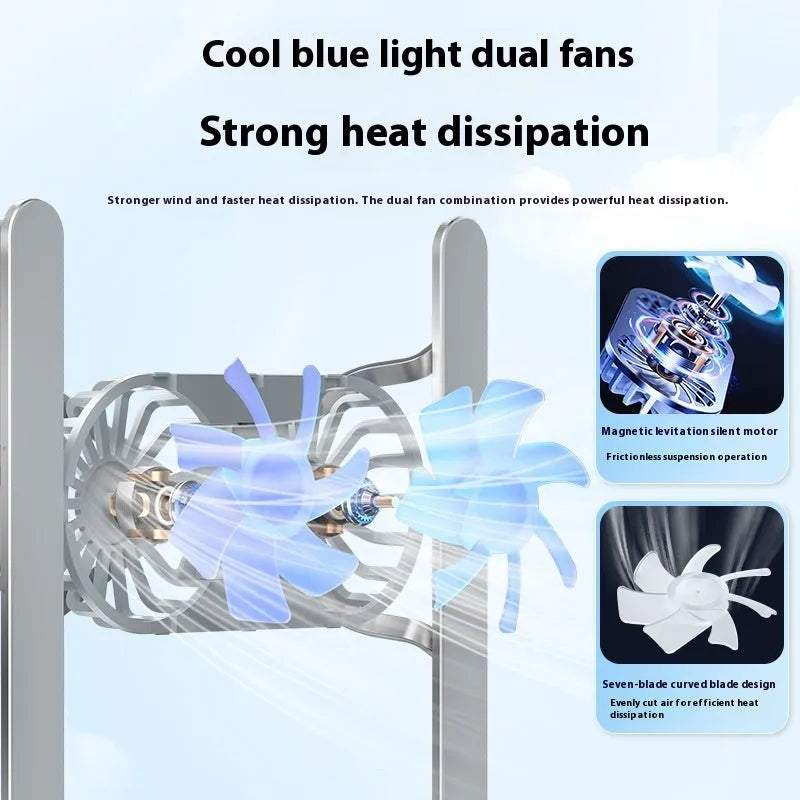 Silver aluminium laptop stand with twin fans raised at an angle on a wooden desk.