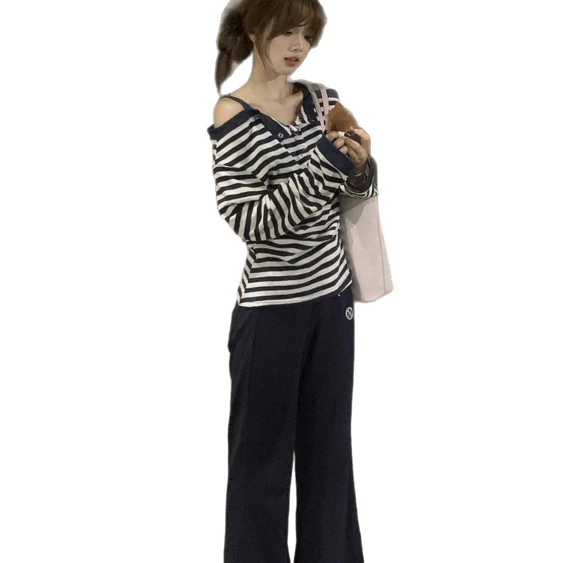 Dark blue oversized women's T-shirt with embroidery, buttons, and striped details in Korean style