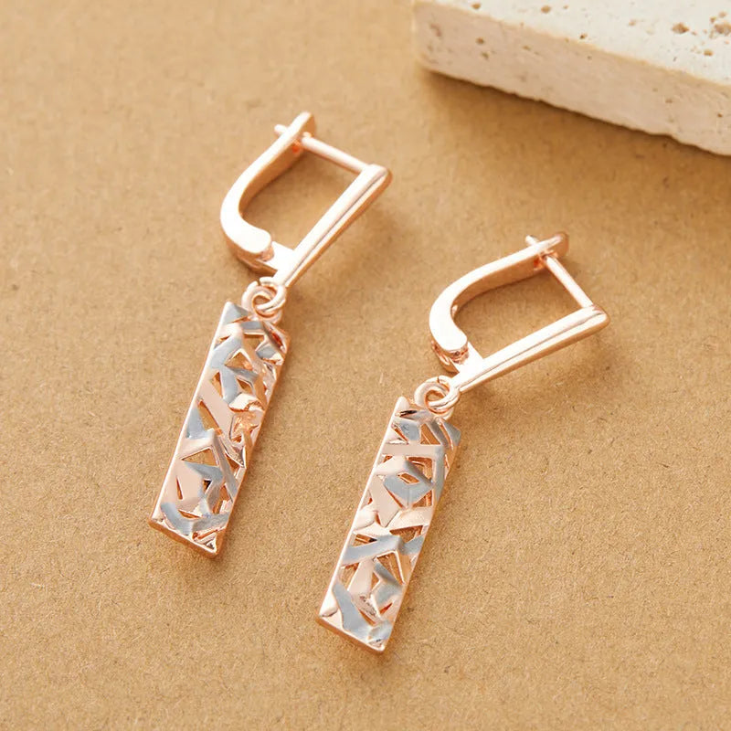 Rectangular two-tone hollow stud earrings for women with electroplated alloy construction