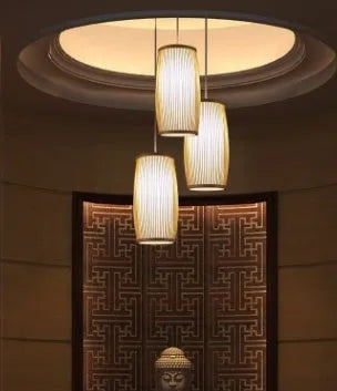 Natural bamboo plait wall lamp with woven design for hall or staircase lighting