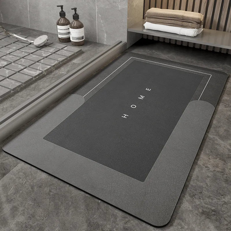 Blended fabric bathroom floor mat in oval and rectangular shapes on a tiled floor.