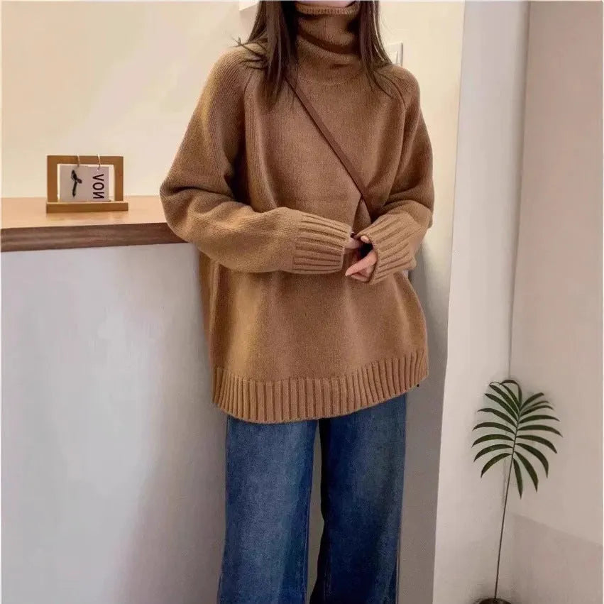 Women's loose red turtleneck sweater with thick curling pile collar, casual style.