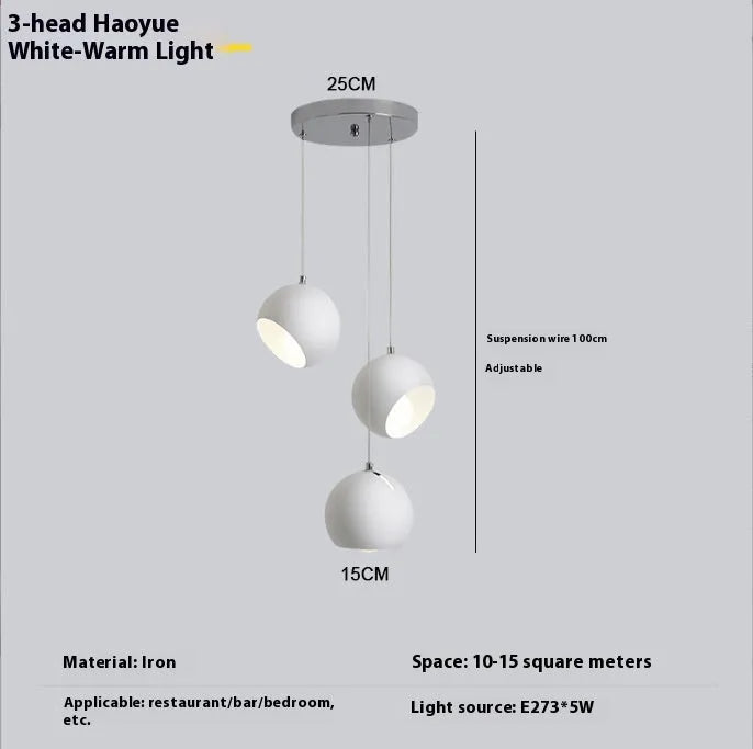 Post-modern ball chandelier table lamp in Moon White or Obsidian Black finish.