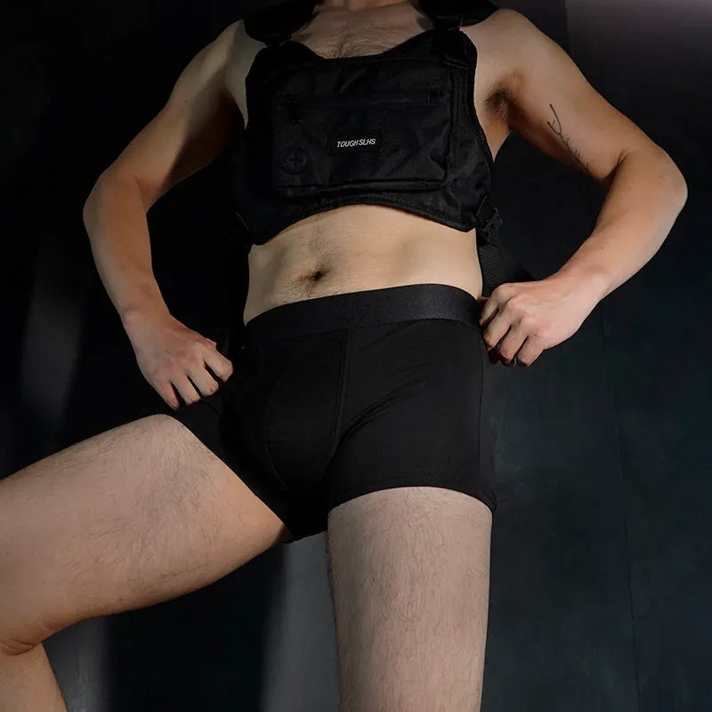Men's solid colour cotton boxer shorts showing available black, white, silver grey, and light green options