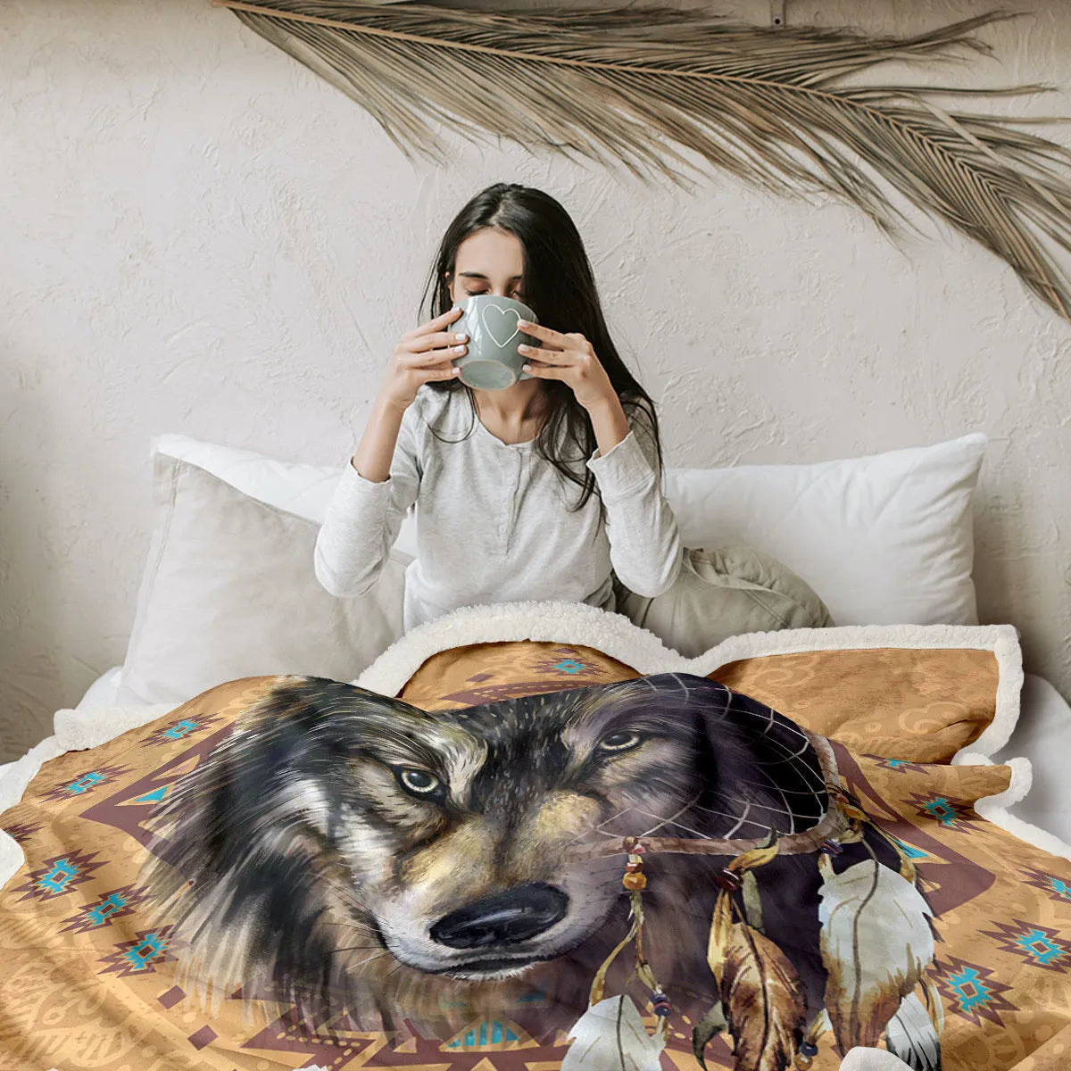 Brown sherpa fleece blanket with wolf head pattern, 150x200cm, on a couch