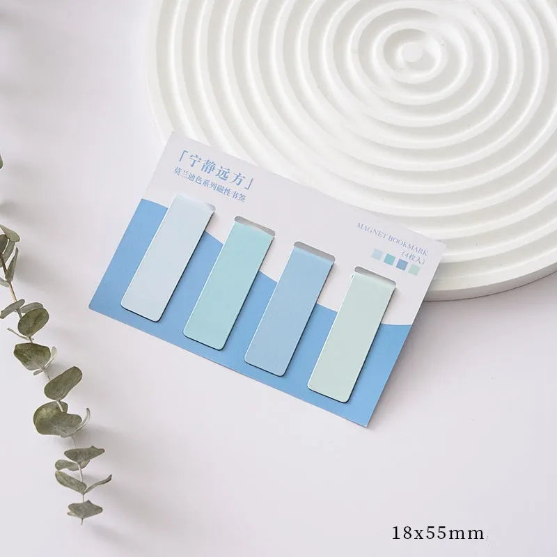 Set of four Morandi Series pastel colour-block magnetic bookmarks on a book page.