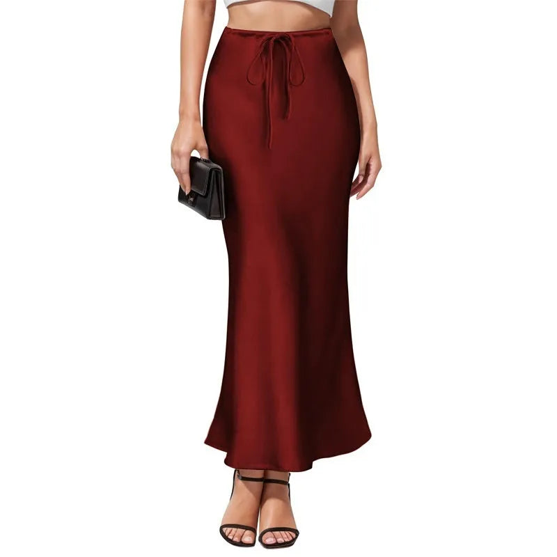 Asymmetric high-waist acetate satin skirt with irregular stitching in solid colour
