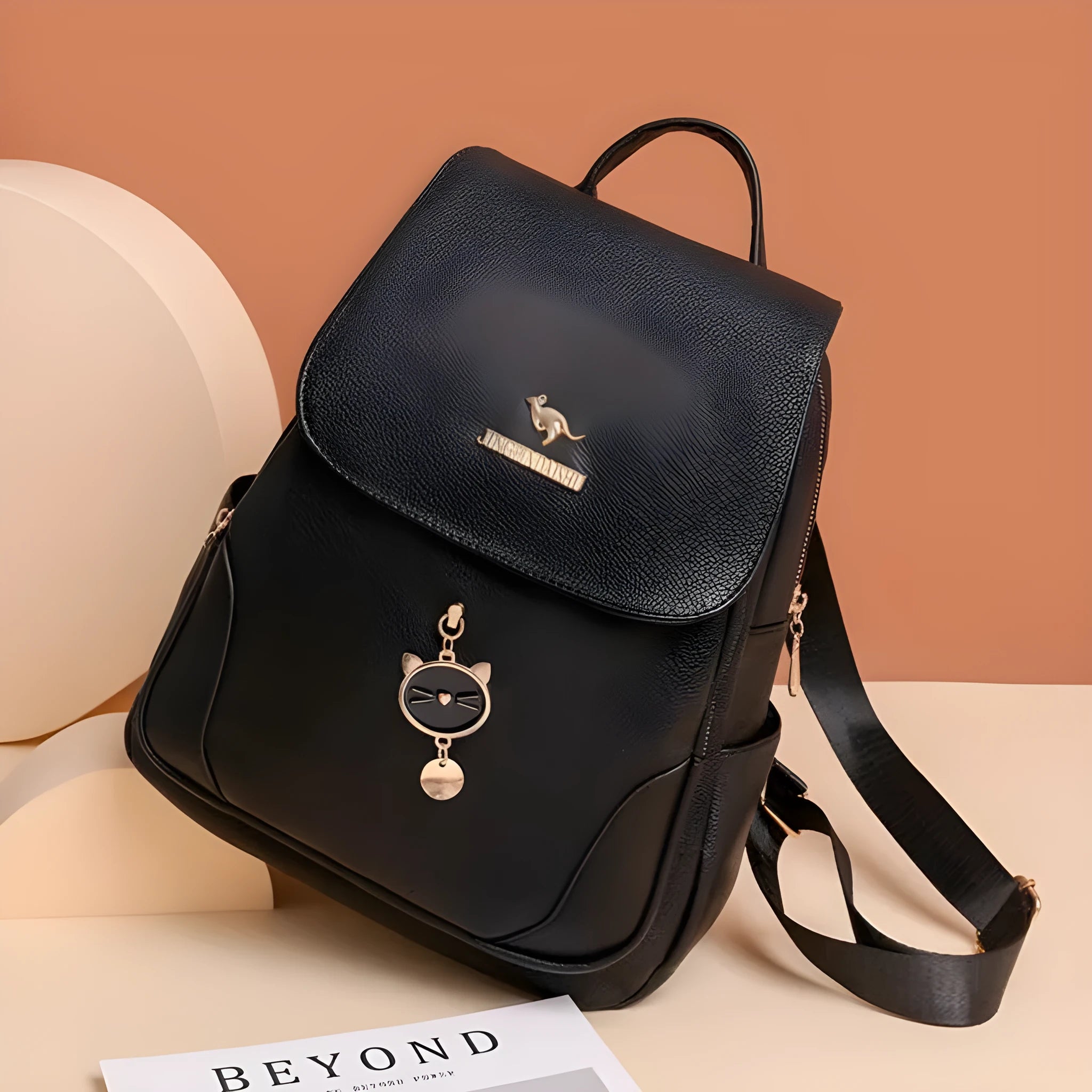 Women's textured leather backpack in black with three-dimensional pockets and street style design