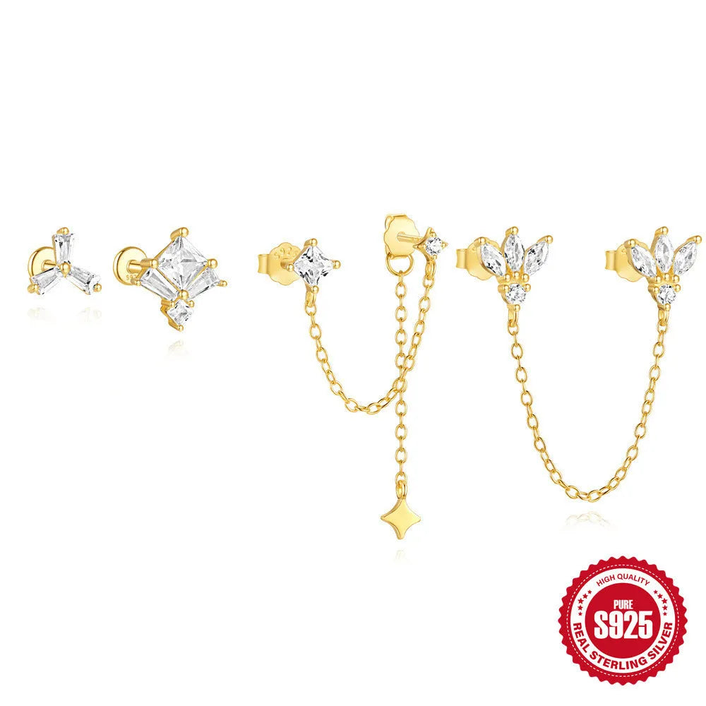Golden geometric sterling silver earrings with zircon details for double piercings