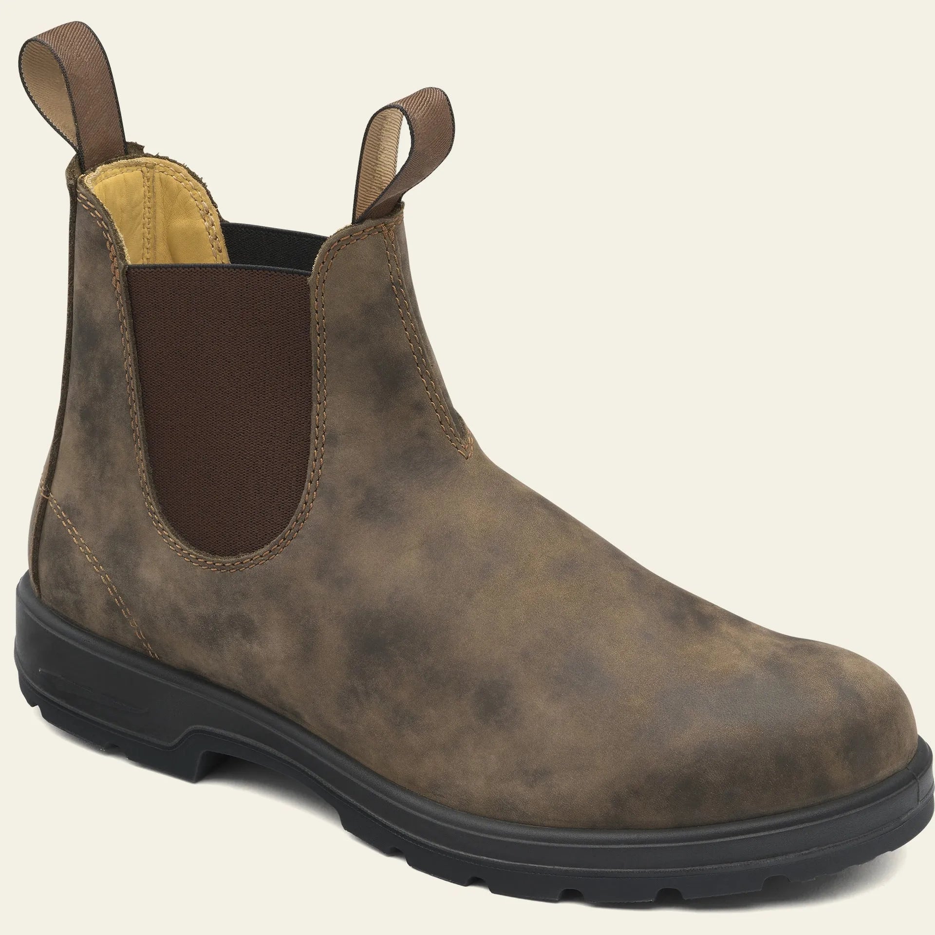 Vintage brown unisex Chelsea boot with frosted PU upper and round toe on a wooden surface.