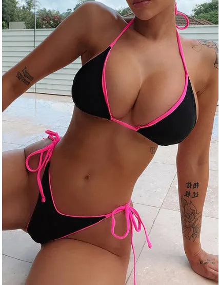 Women's lace-up triangle bikini top with matching split-leg bottoms in a colour style.