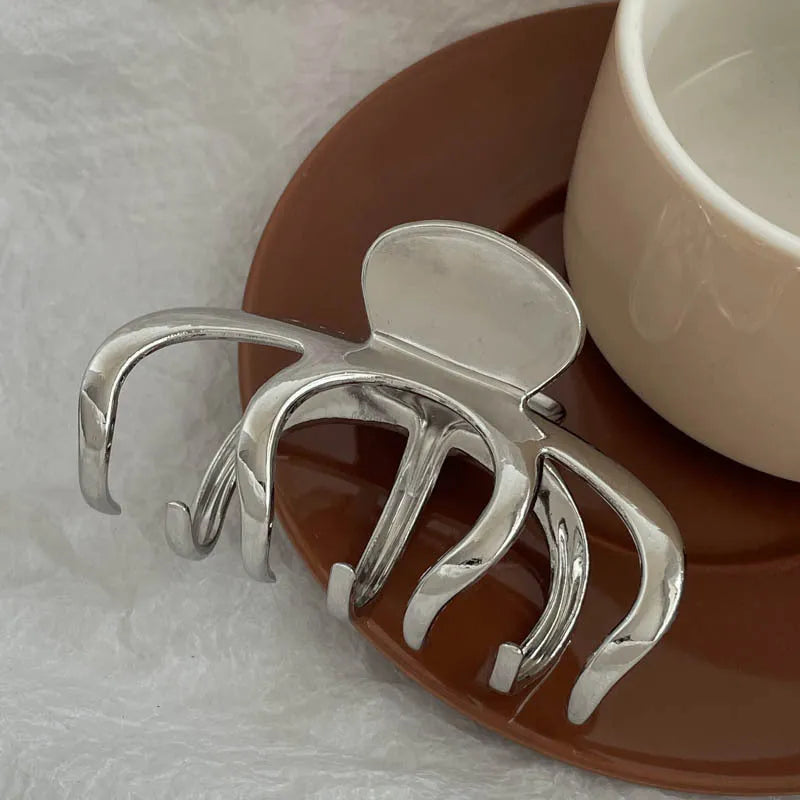 Silver metal hair barrette claw clip with electroplated finish and decorative design