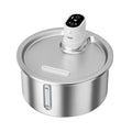 White stainless steel heated water fountain for cats and dogs on a counter