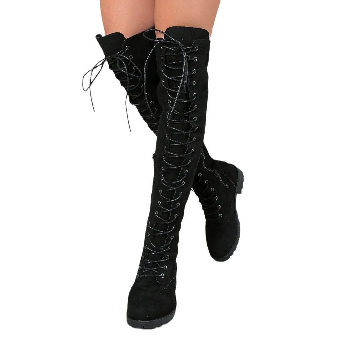 Women's black lace-up over-the-knee boots with round toe and flat rubber sole on a neutral background.