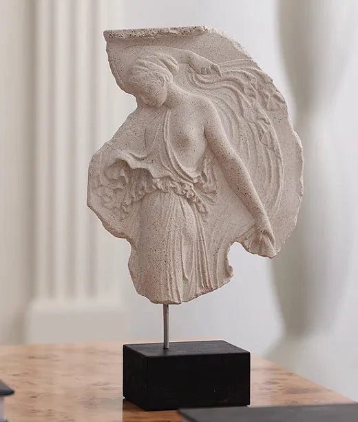 A 35cm tall synthetic resin wine goddess ornament on a table.