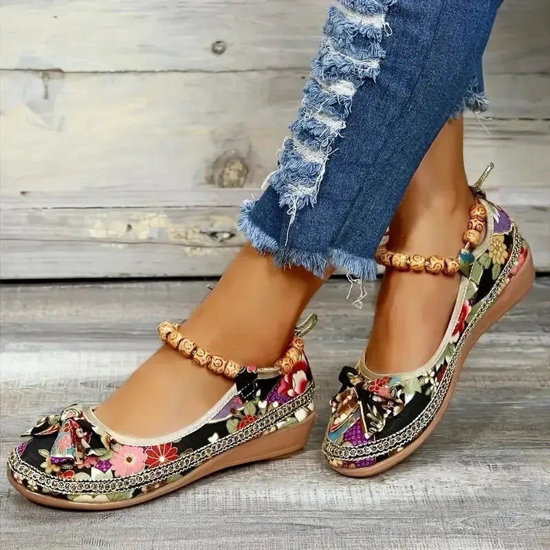 Women's plus size black ethnic platform sandals with elastic band and round toe on a PU sole.