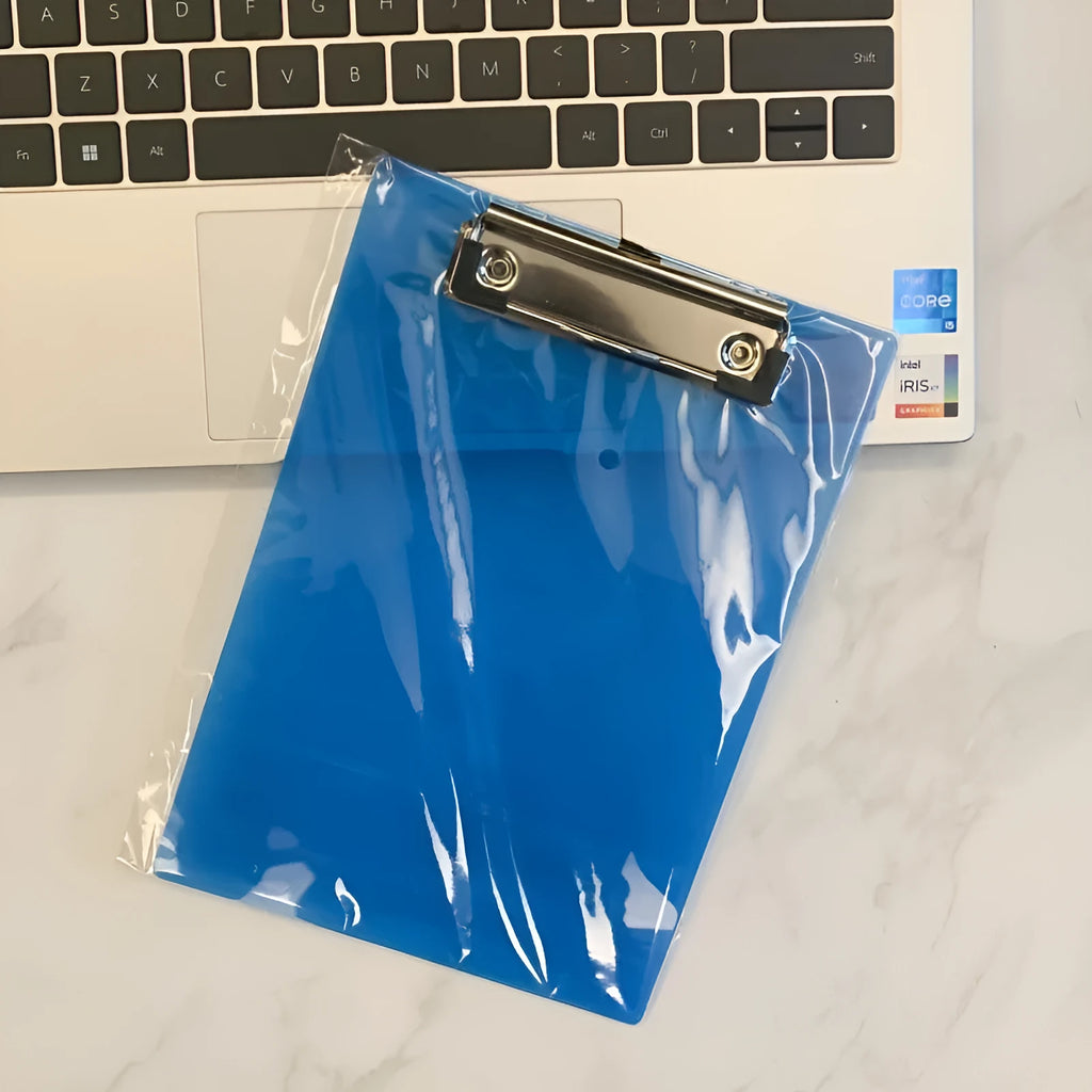Transparent A4 plastic writing board pad with a silver metal clip, shown in blue colour.