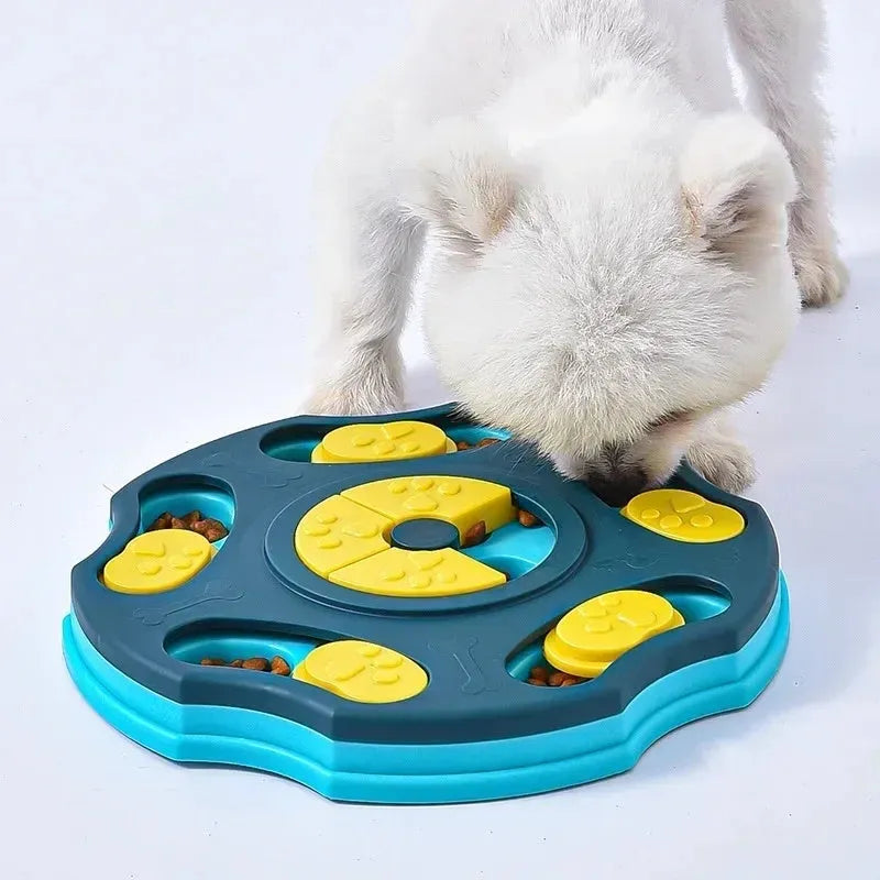 Blue and pink dog puzzle feeder toy with multiple compartments for interactive food searching gameplay
