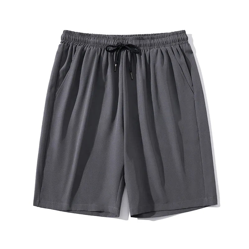 Men's cropped quick-dry sports casual pants in nylon, shown in blue colour.