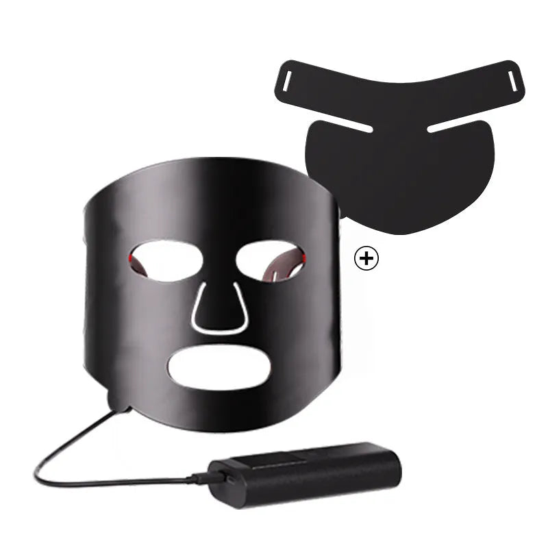 Black and gold LED phototherapy face mask with controller for home skin treatment.