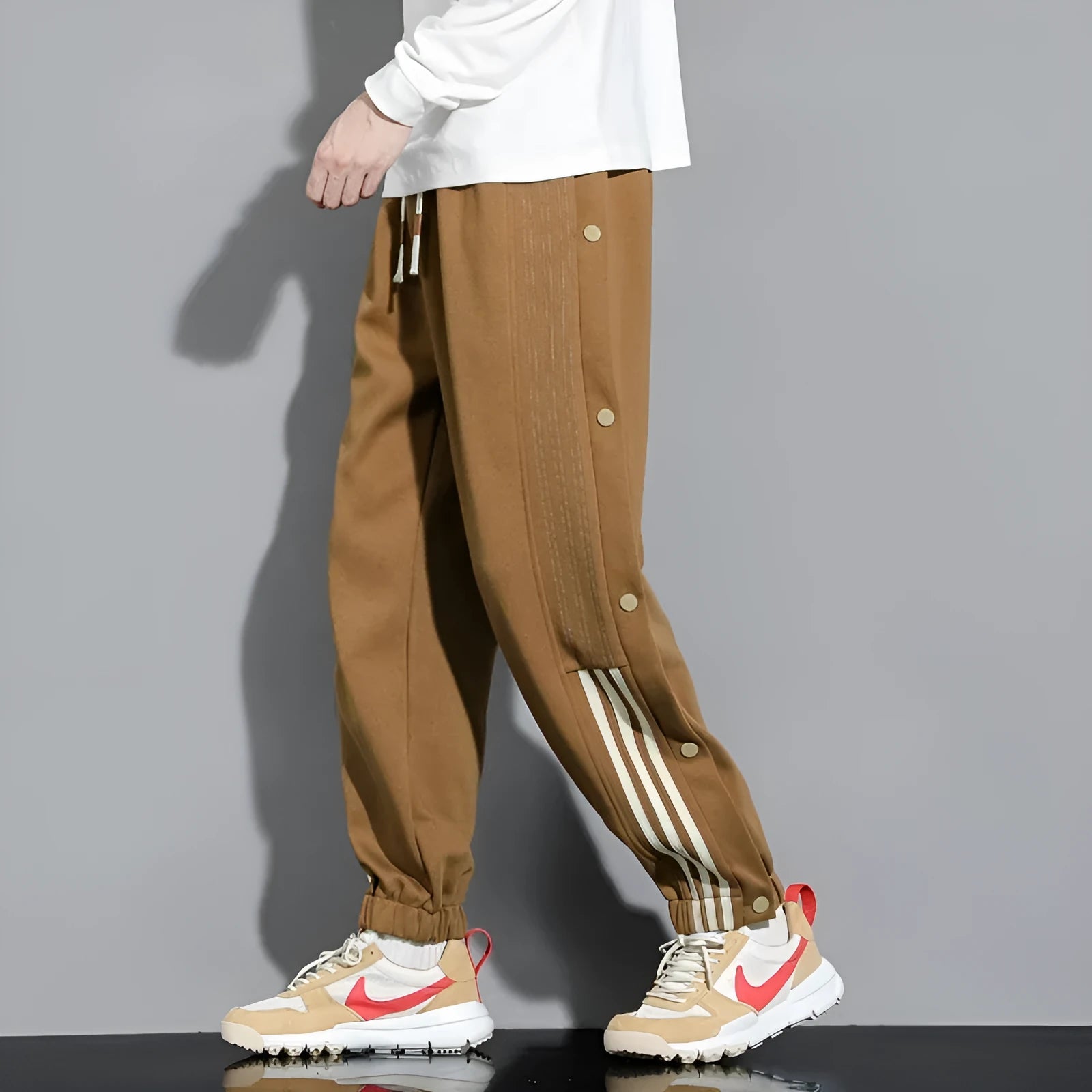 Men's loose fit cotton blend sports trousers with ankle tie fastenings and drawstring waist
