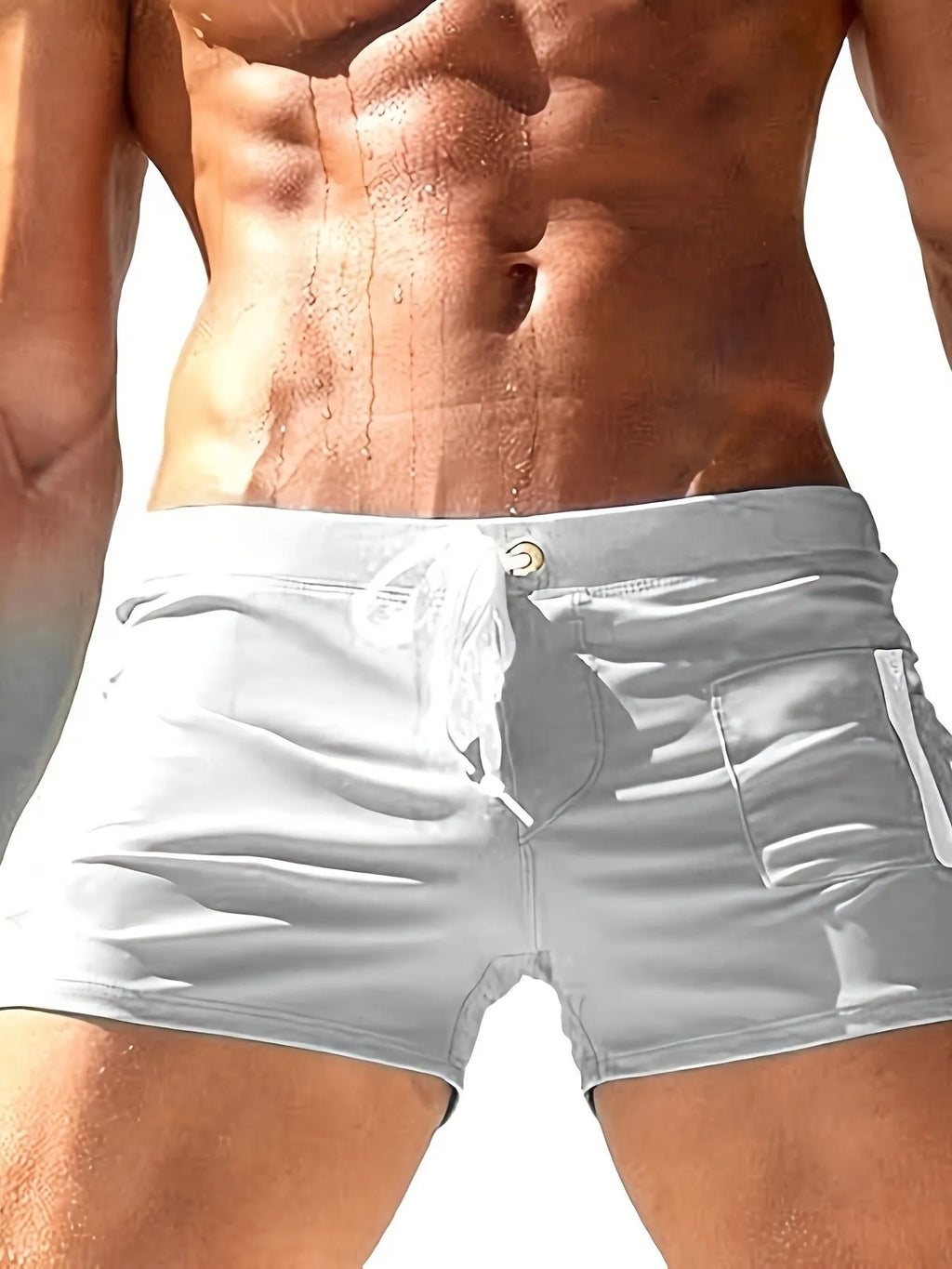Men's solid colour high-waist swimming trunks with lace-up front, shown in black, for swimming and fitness