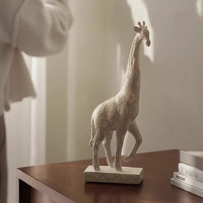 Wood colour synthetic resin giraffe decorative ornament on a shelf.