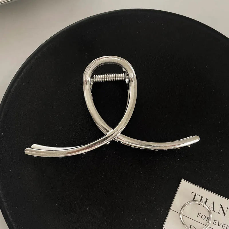 Silver metal hair barrette claw clip with electroplated finish and decorative design