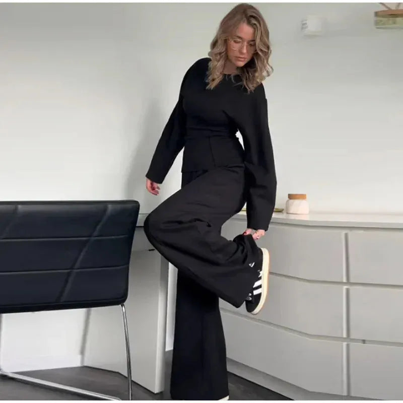 Women's polar fleece two-piece suit set showing long sleeve O-neck top with wide-leg trousers