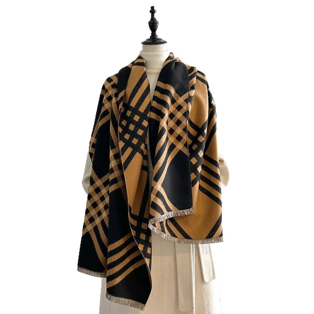 Cashmere-like scarf with tassel detailing in brown colour showing mid-length design