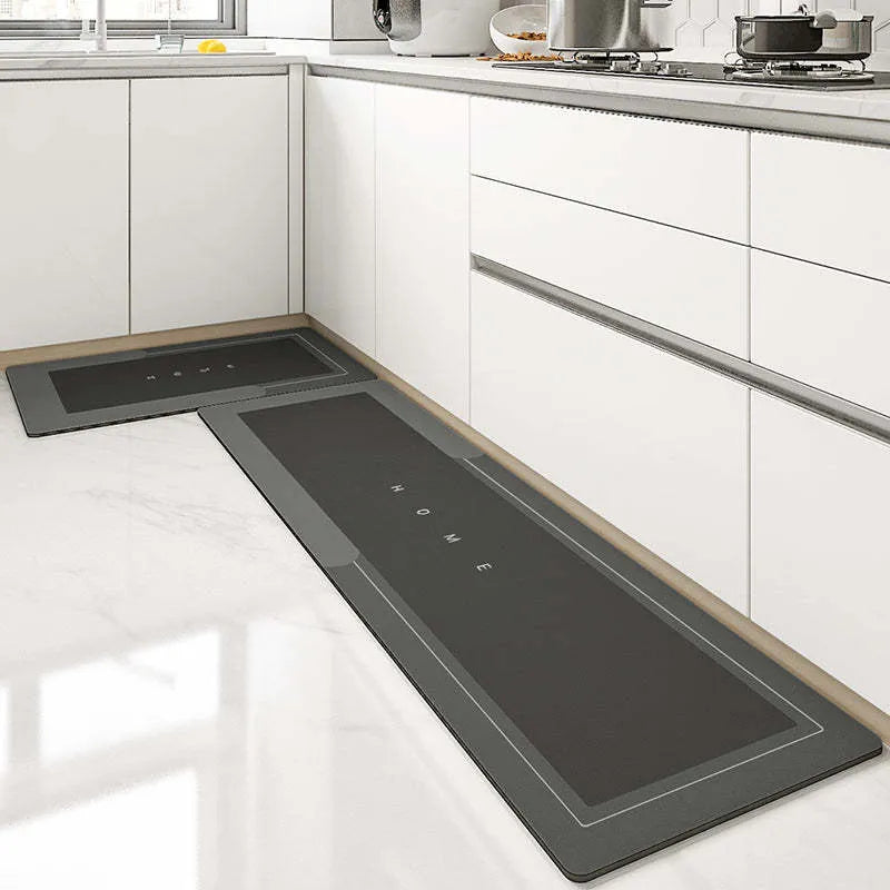 Blended fabric bathroom floor mat in oval and rectangular shapes on a tiled floor.