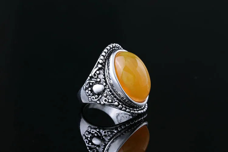 Geometric alloy ring with an antique silver amber electroplated finish.