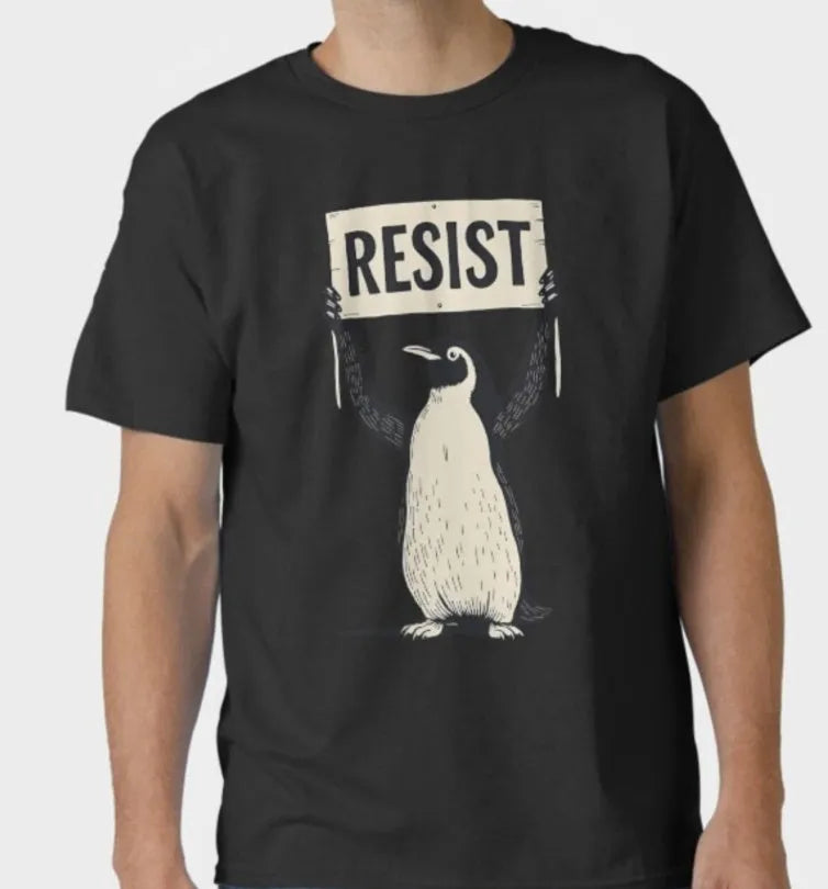 Loose-fit cotton T-shirt in black, short sleeves and round neck.