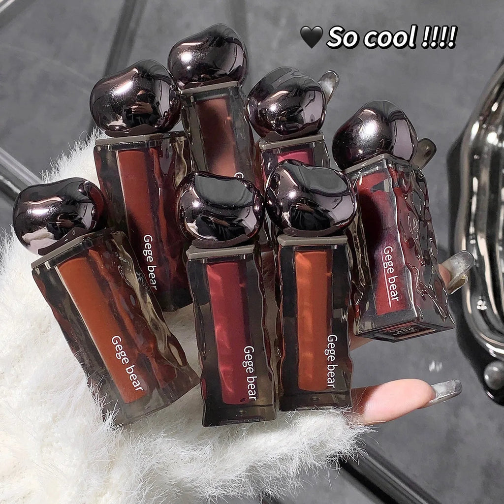 Glacier Lava Lip Lacquer in water-light mirror finish showing seven numbered colour options