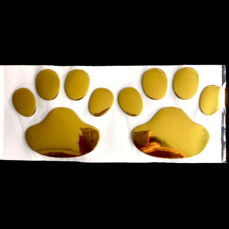 Pair of red dog footprint car stickers in a hand-shaped brush style on a white background.