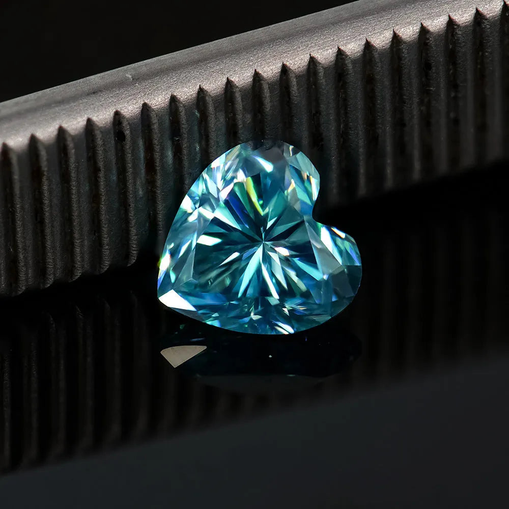 Lemon yellow heart-shaped moissanite stone measuring 5mm by 5mm