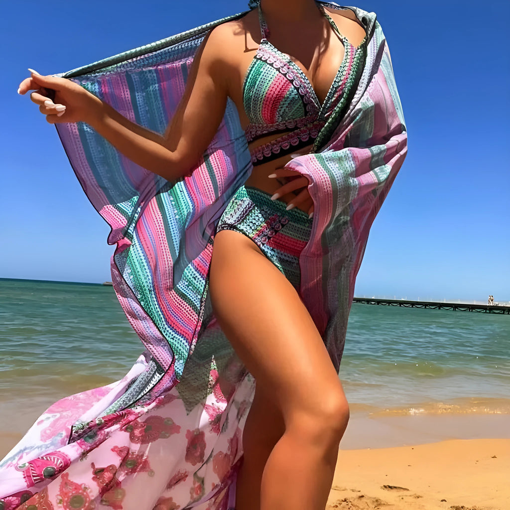 Women's blue three-piece bikini swimsuit with cross bandage bra, high waist briefs and veils split smock