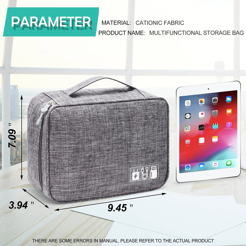Black and grey waterproof electronics organiser bag open to show removable dividers and mesh pockets for cables.