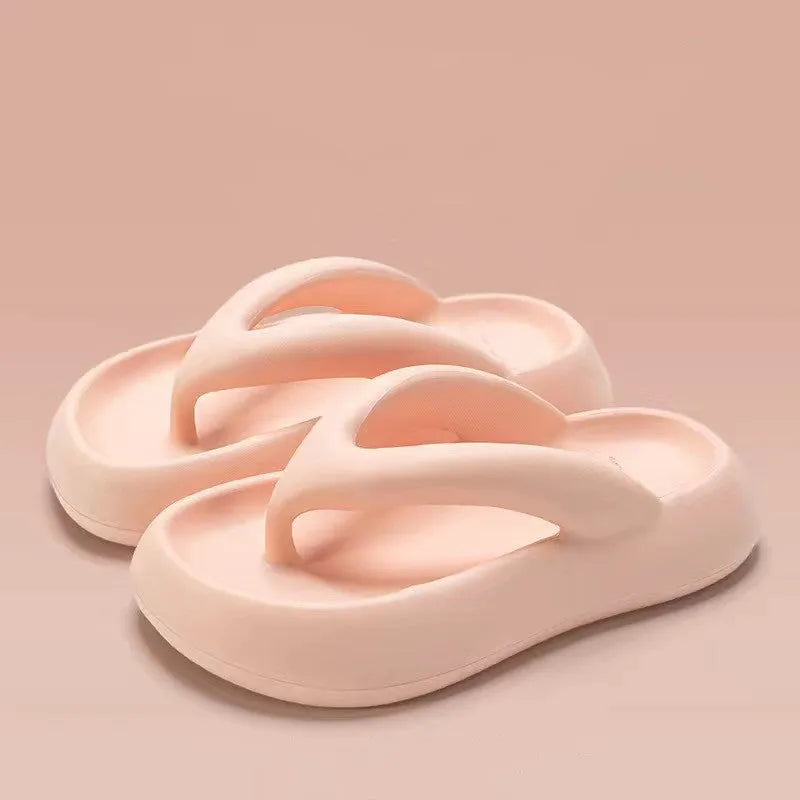 Women's thick-soled EVA flip-flops with a bow detail in assorted colours on a white background.