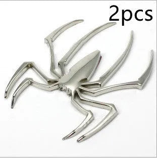 Three-dimensional metal spider bumper sticker in zinc alloy, showing detailed design