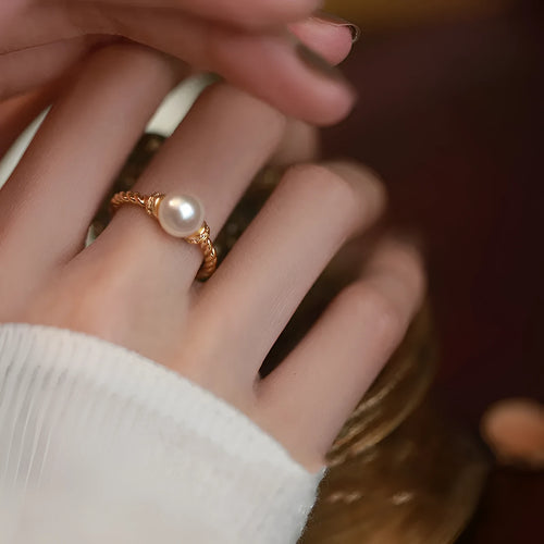 Adjustable copper pearl ring with geometric antique twist design in gold and silver finish options