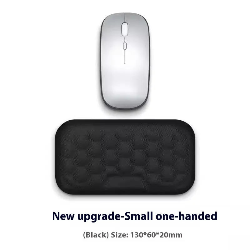 Memory foam mouse wrist rest pad with silicone base in black cloth cover option on desk