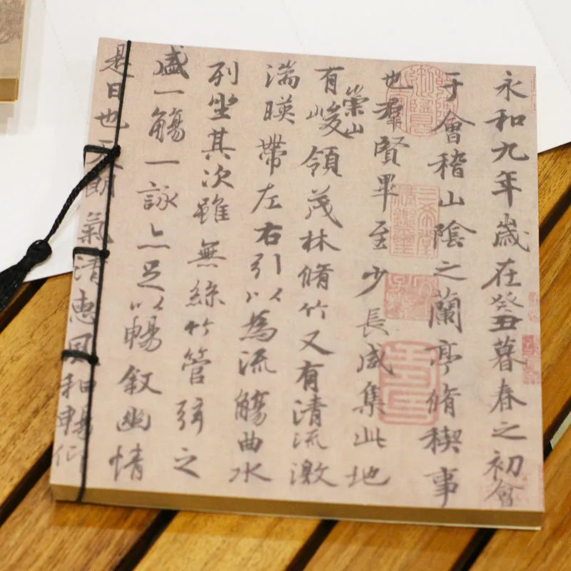 A5 antique wire-bound notebook with retro painting design on white cowhide cover