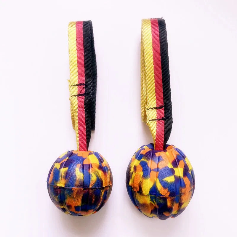 Floating EVA tether ball for dogs in camouflage or yellow colour with three diameter size options