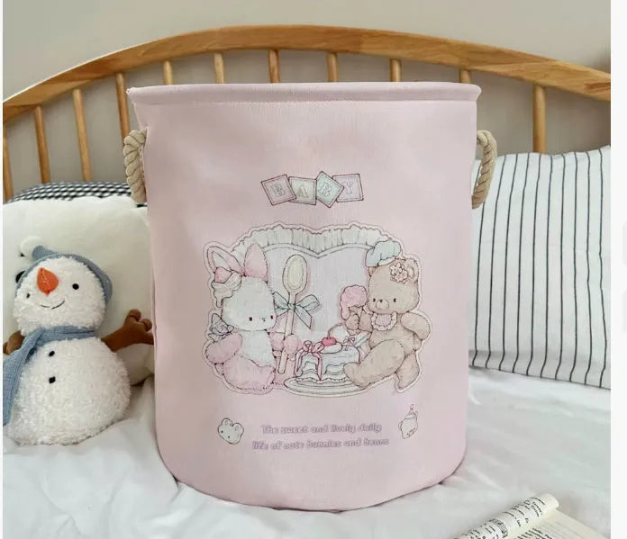 Foldable cotton laundry basket in a colourful design, shown unfolded for use.