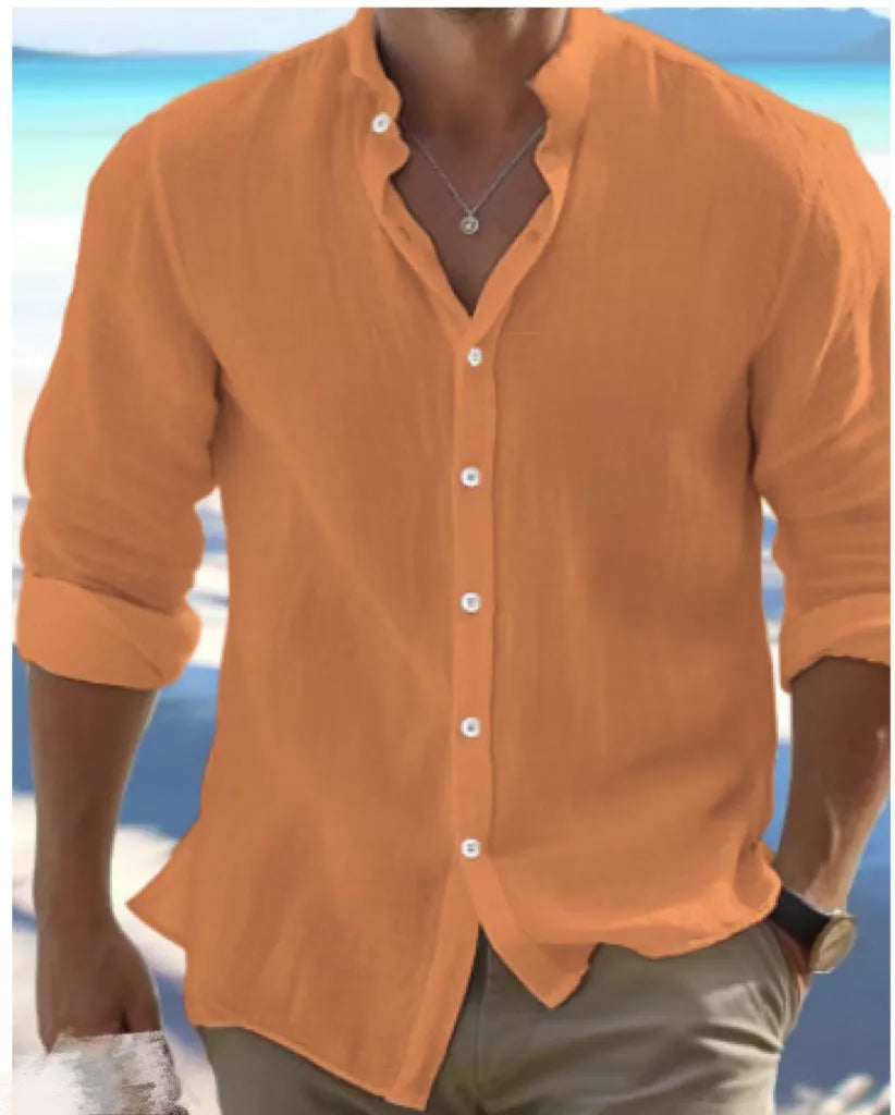 A man's light grey casual pullover shirt made from long-staple cotton fabric, shown on a hanger.