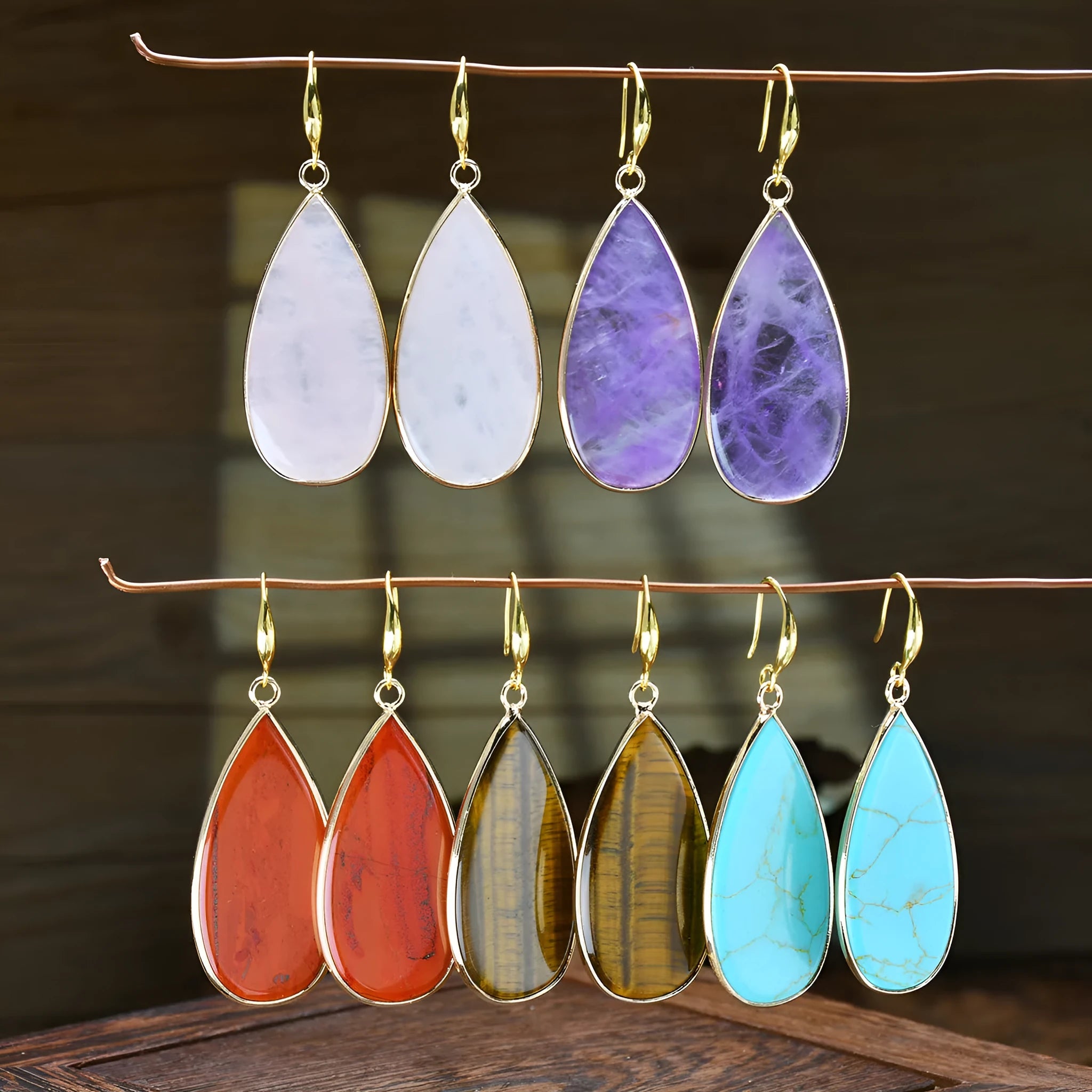 Vintage tigereye stone drop earrings with elongated water drop shape and textured elements