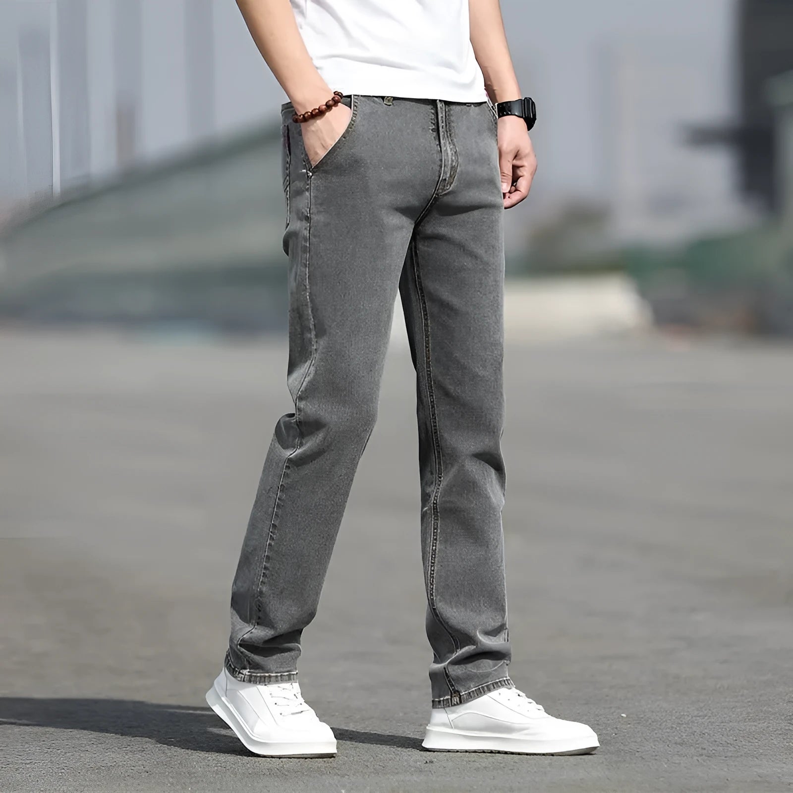 Men's smoky grey autumn jeans with straight tube fit and low waist design on hanger